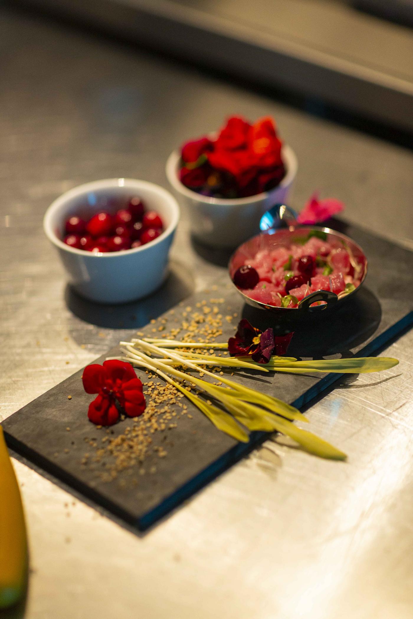 Tuna dish prepared by Chef Meesen at George V and plated on a slate tile